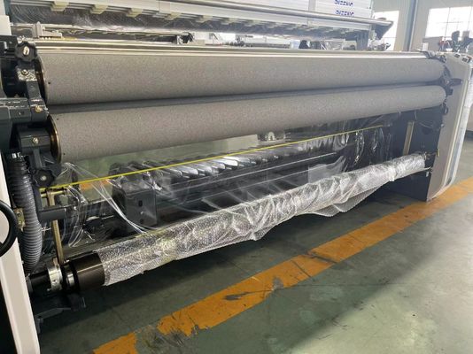 पॉलिएस्टर फैब्रिक के लिए कैम शेडिंग के साथ हाई स्पीड हाई डेंसिटी वॉटर जेट वीविंग टेक्सटाइल लूम।